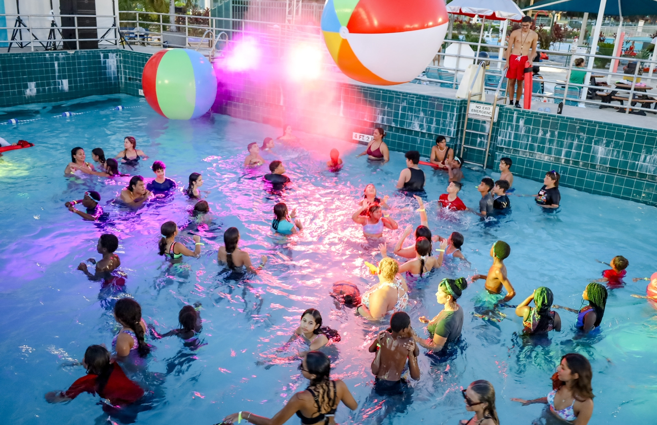 View of the wave pool at the McDonald's Aquatic with lights and beach pools